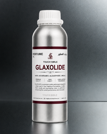 A silver aluminum bottle of Glaxolide perfume oil with a white cap, set against a dark gray gradient background.