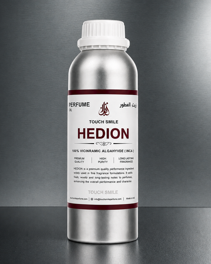 A silver aluminum bottle of Touch Smile Hedion perfume oil, featuring a white label with red and black text, set against a dark gray gradient background.